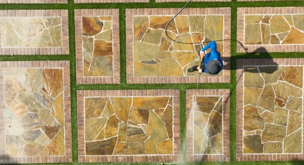 legant Styles Power Washing crew restoring walkways with eco-friendly cleaning methods