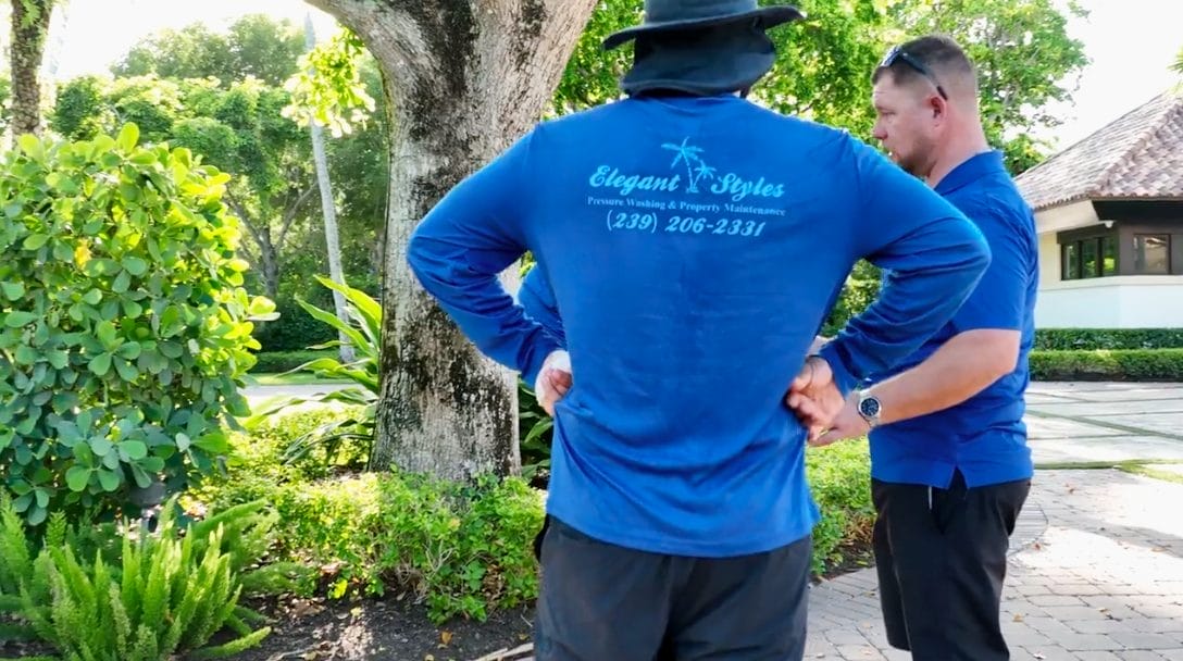 Professional exterior cleaning team in Naples, FL using eco-friendly soft washing techniques.