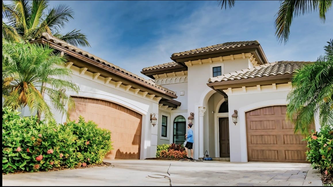 Exterior cleaning service in Naples FL helping prevent costly home repairs with soft washing and pressure washing.