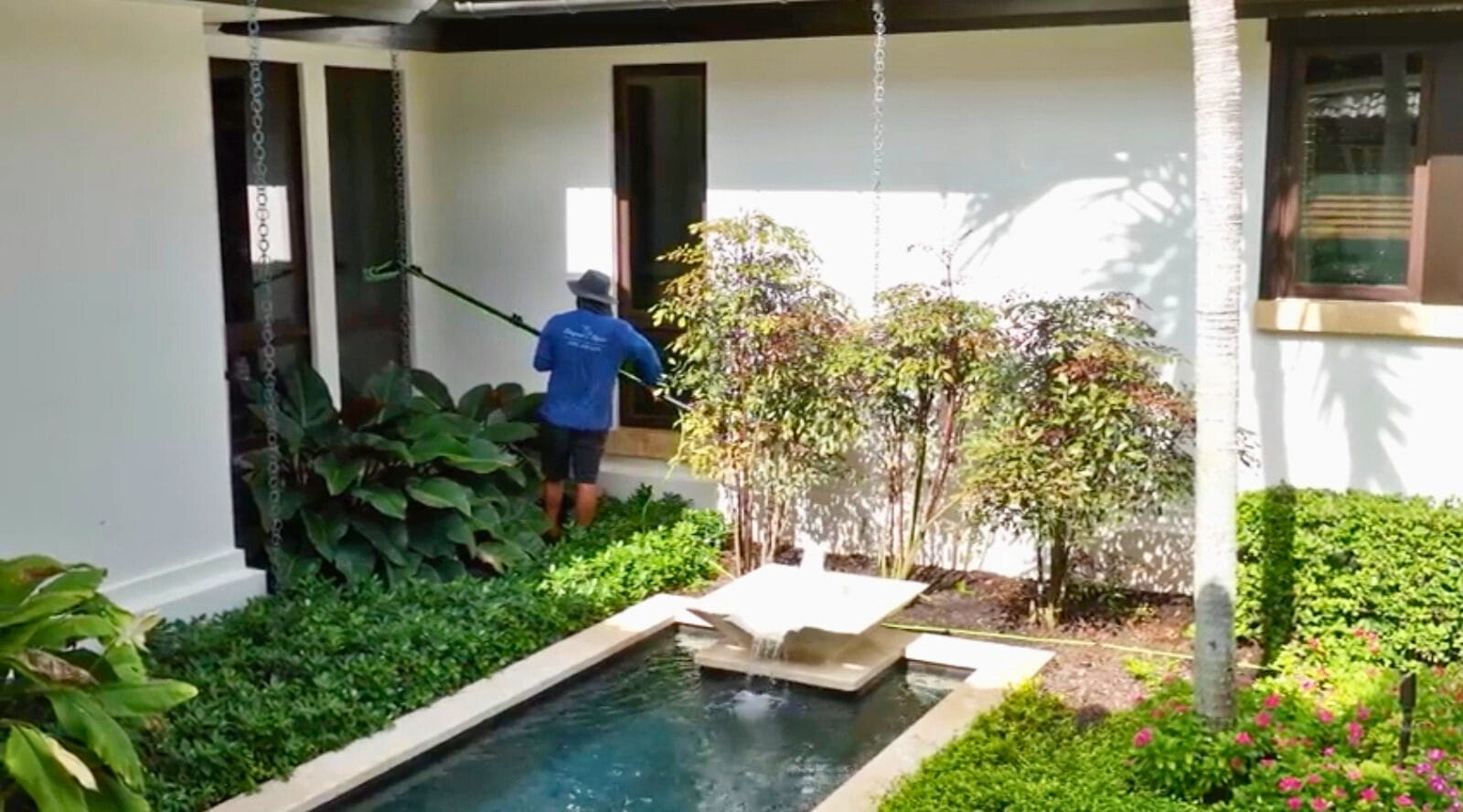 hard water stain removal service in Naples FL restoring clarity to residential windows and exterior glass.