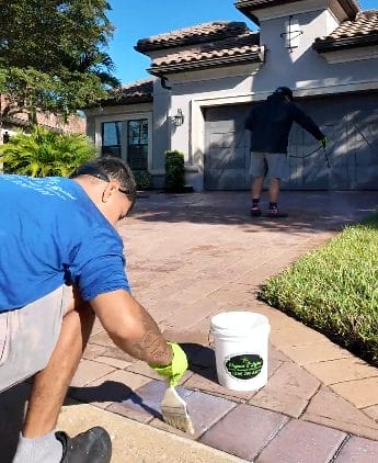 Professional paver sealing in Naples, Florida with balanced pH cleaning solutions for long-lasting protection.