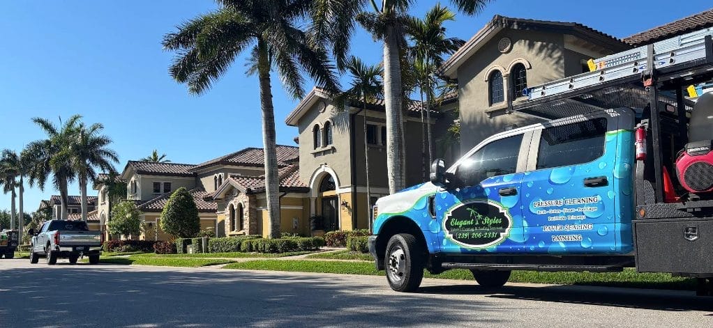 Soft washing a Naples FL home exterior by Elegant Styles Power Wash for improved efficiency and savings.