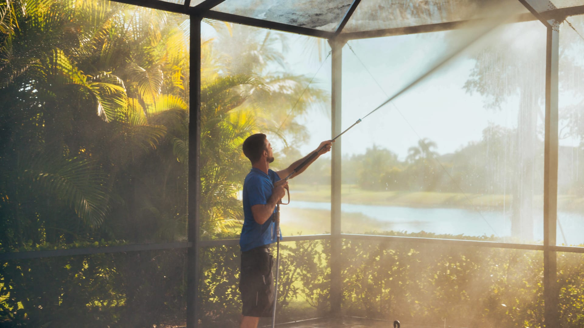 Sustainable pool cage cleaning in Naples, FL by Elegant Styles Power Wash using biodegradable solutions and soft washing methods to protect your home and the environment.