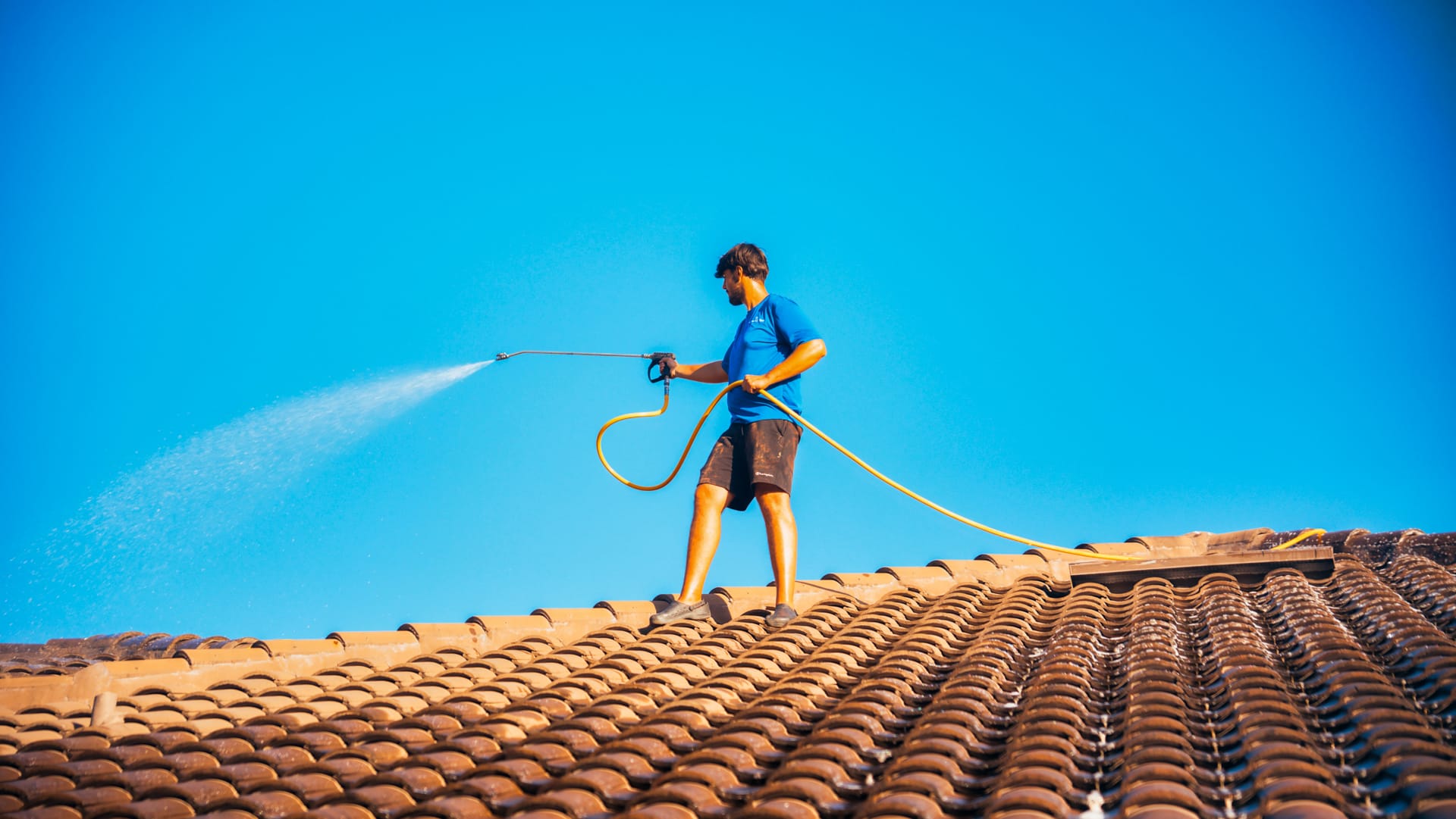 Roof pressure washing in Naples Florida home