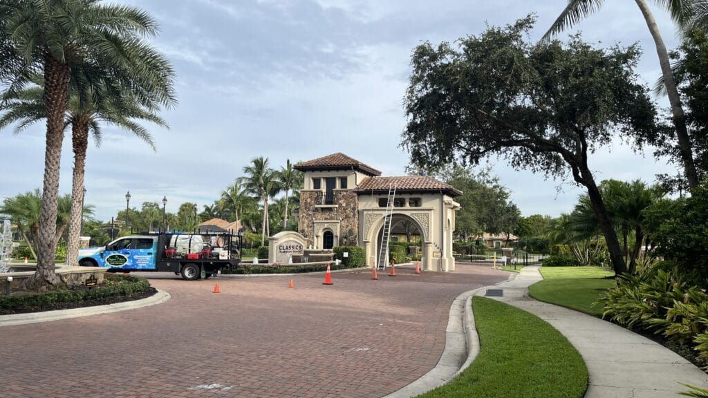 Professional driveway cleaning in Naples, FL by Elegant Styles Power Wash—removing stains and grime to enhance curb appeal.