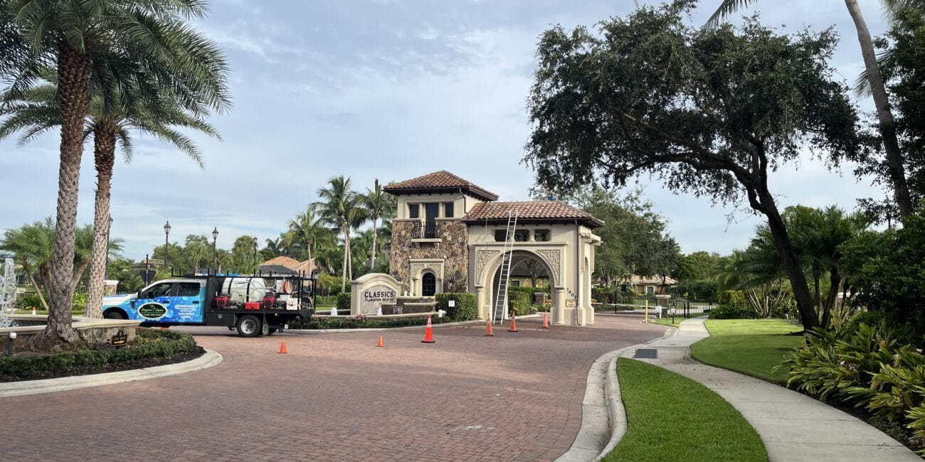Professional driveway cleaning in Naples, FL by Elegant Styles Power Wash—removing stains and grime to enhance curb appeal.