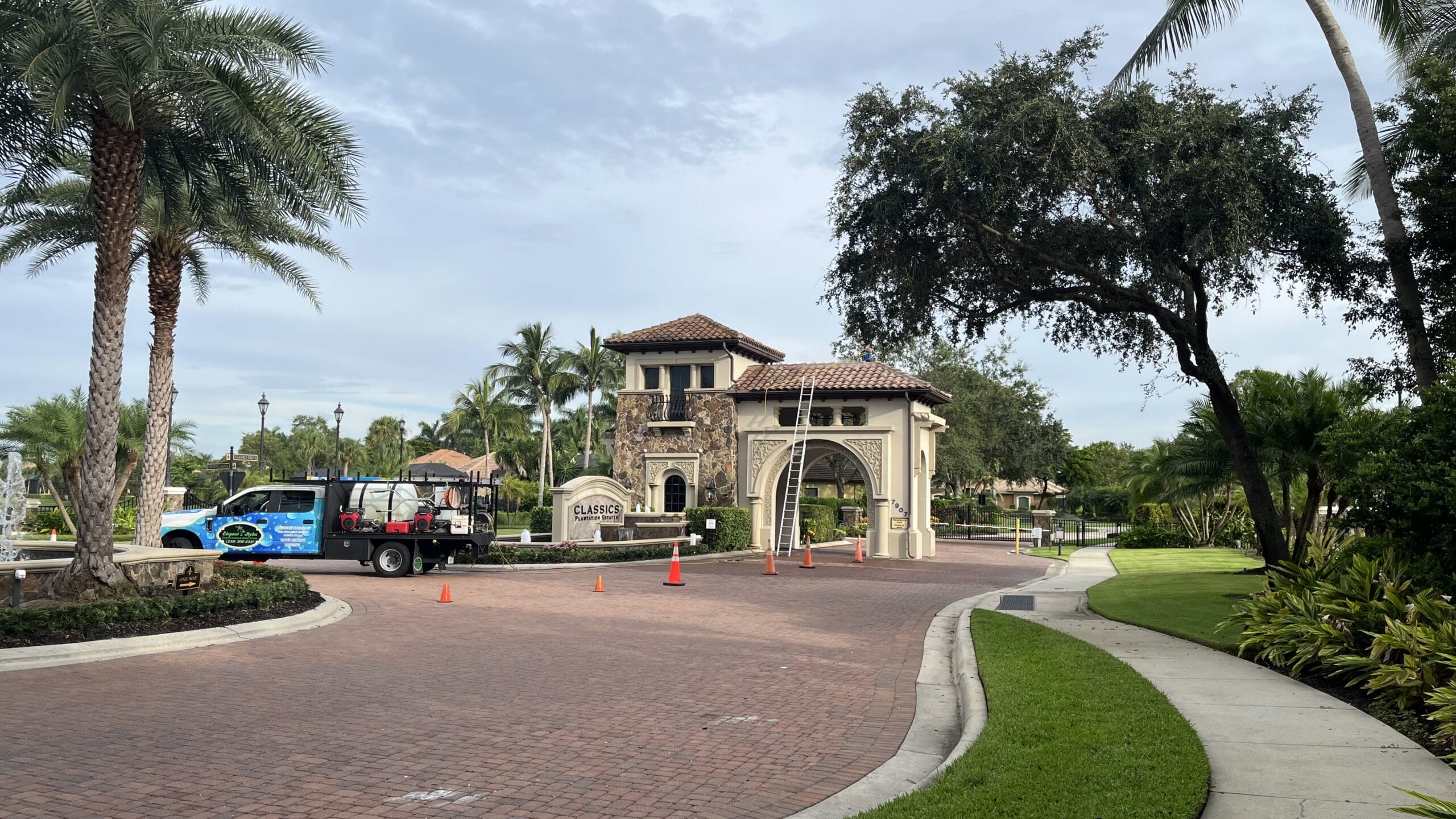 Professional driveway cleaning in Naples, FL by Elegant Styles Power Wash—removing stains and grime to enhance curb appeal.