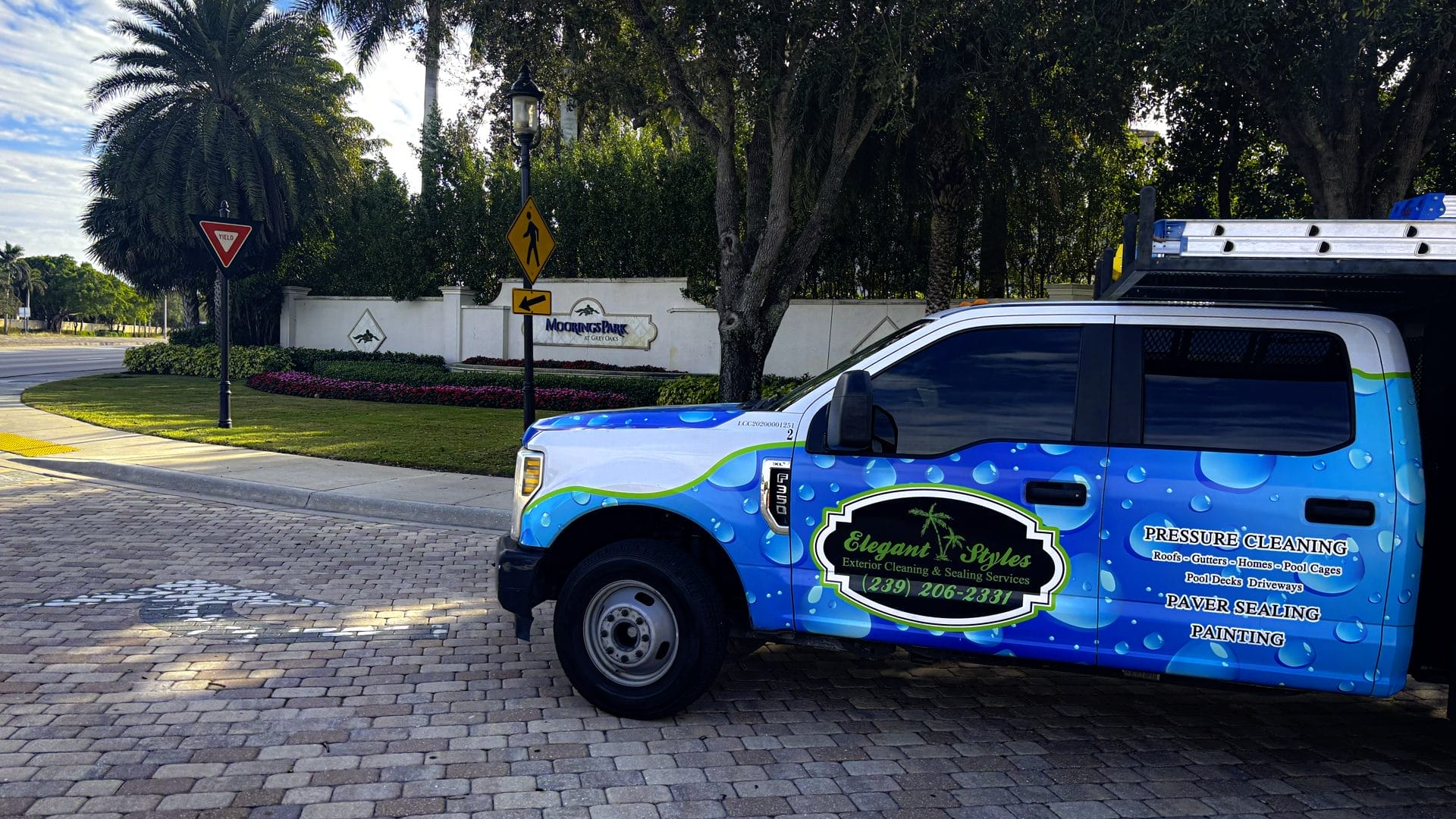 Pressure washing a luxury home in Moorings-Coquina Sands Naples FL by Elegant Styles Power Wash.